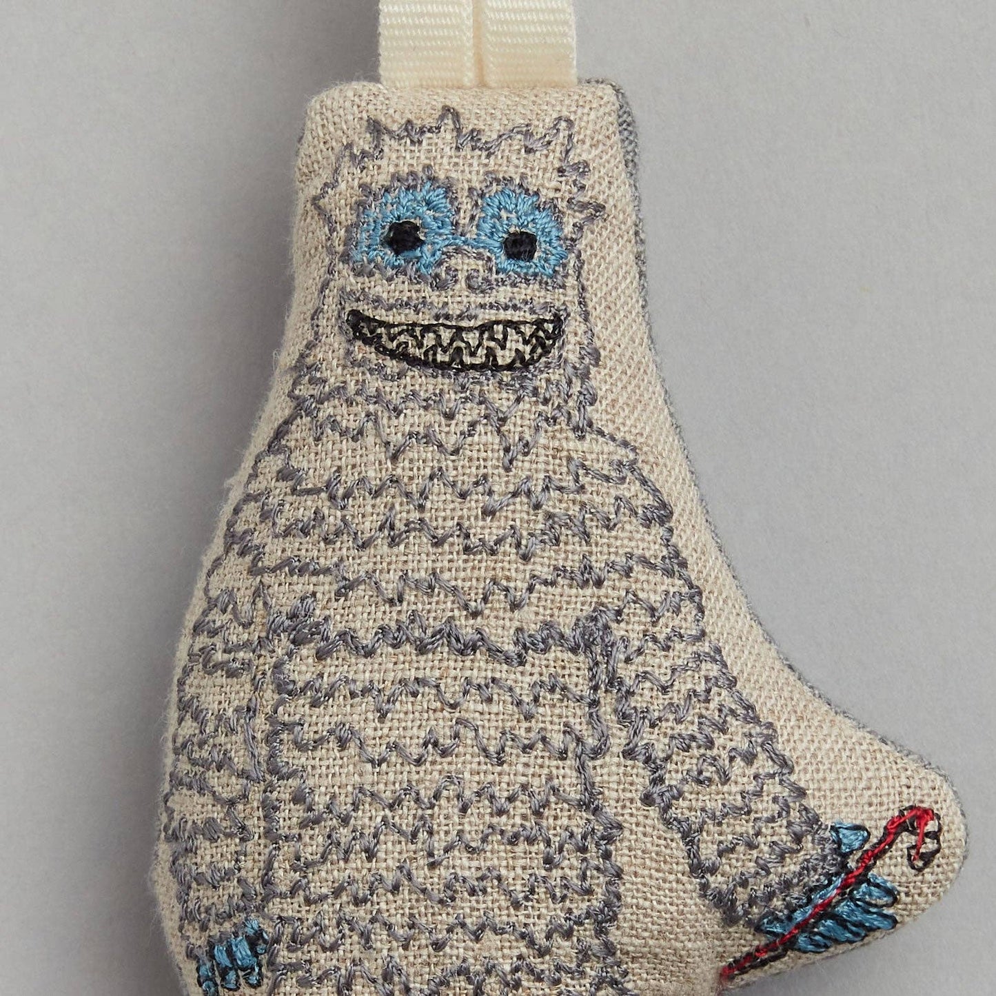 Yeti with Candy Cane Ornament